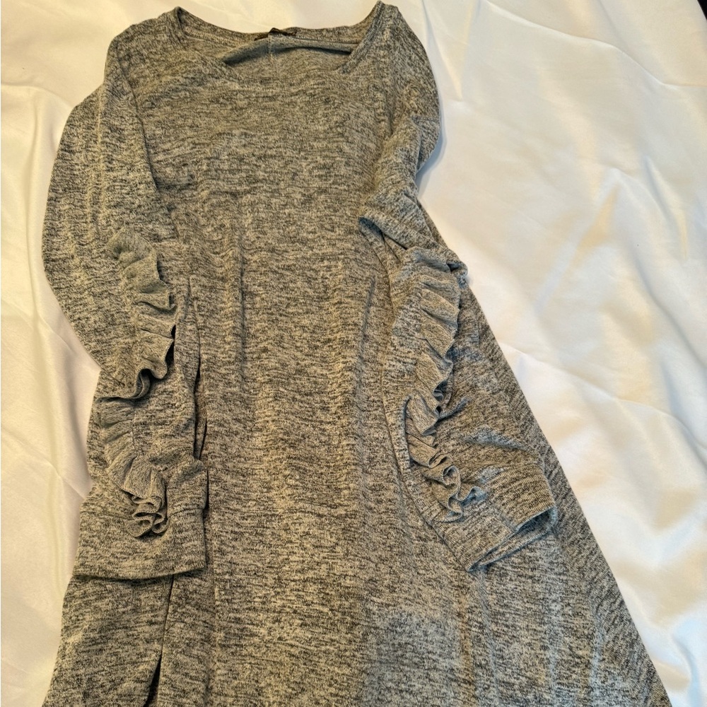 Reborn size medium, could definitely fit L and a small XL. Knee length at 5'5.